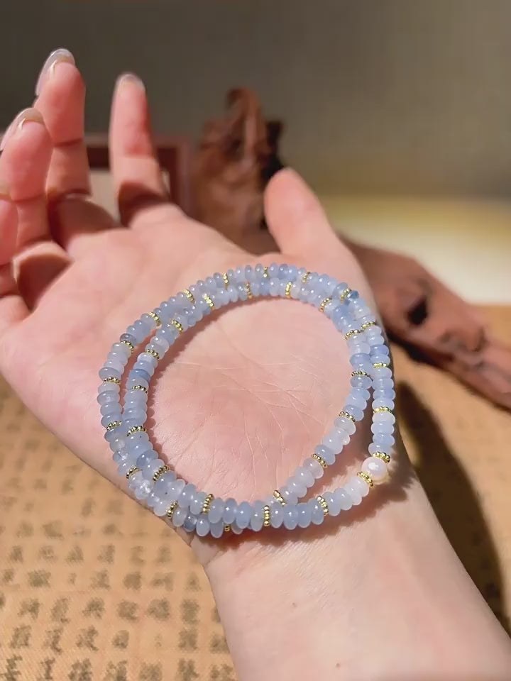 Rose quartz and baroque pearl double wrap bracelet for attracting love and compassion.