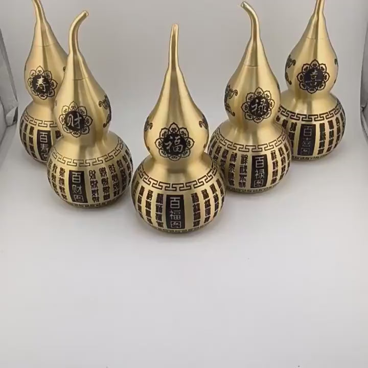 Large Feng Shui Brass Gourd ornament engraved with the Chinese blessings Fu, Lu, Shou, Xi, Cai for wealth and good fortune.