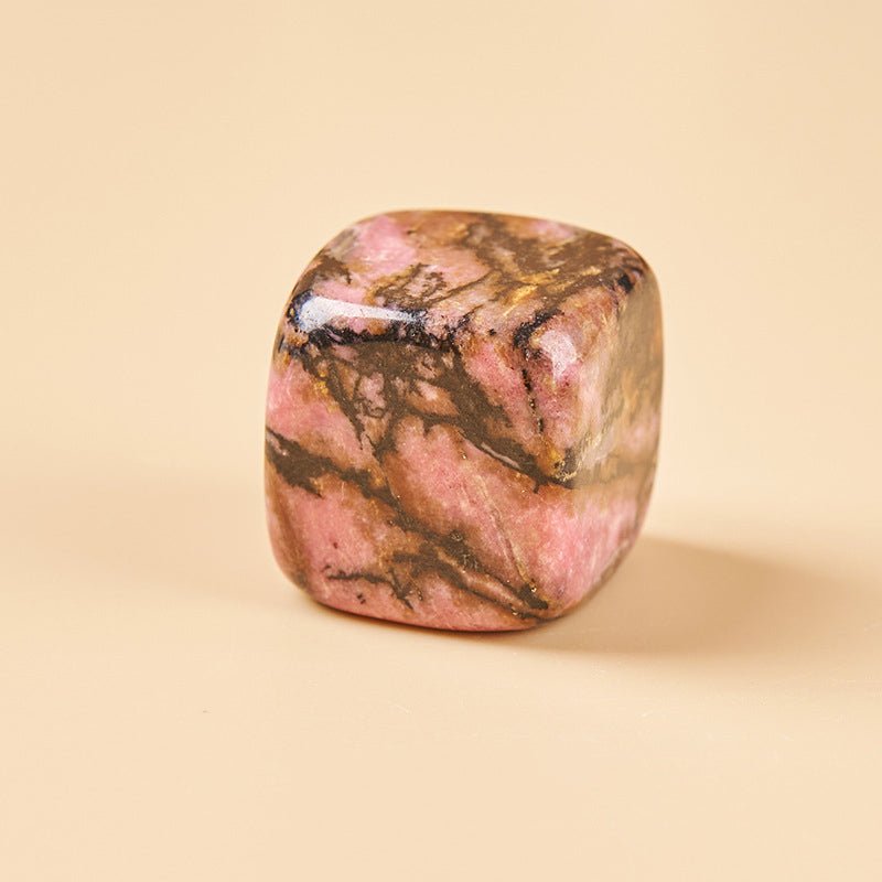 Rhodonite crystal incense holder for emotional balance and compassion in your sacred space.