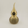 Macro view of the Shou (寿) longevity symbol on the brass gourd, for health and a long life.